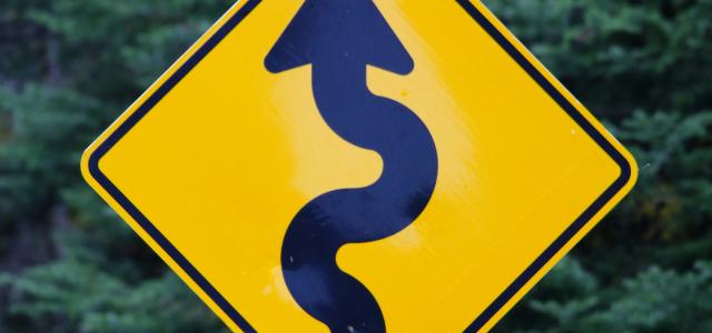 yellow and black arrow sign by Mark König courtesy of Unsplash.